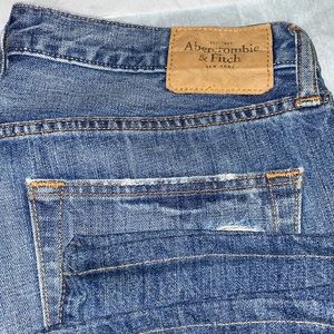 Used Abercrombie Fitch Ripped Blue Jeans . Size 34\32 Boot cut